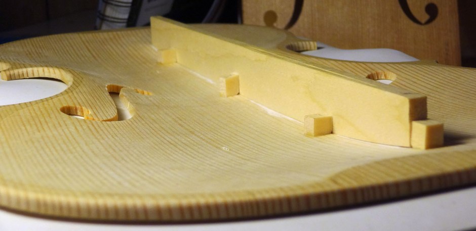 chalk fitting violin bass bar with cleats